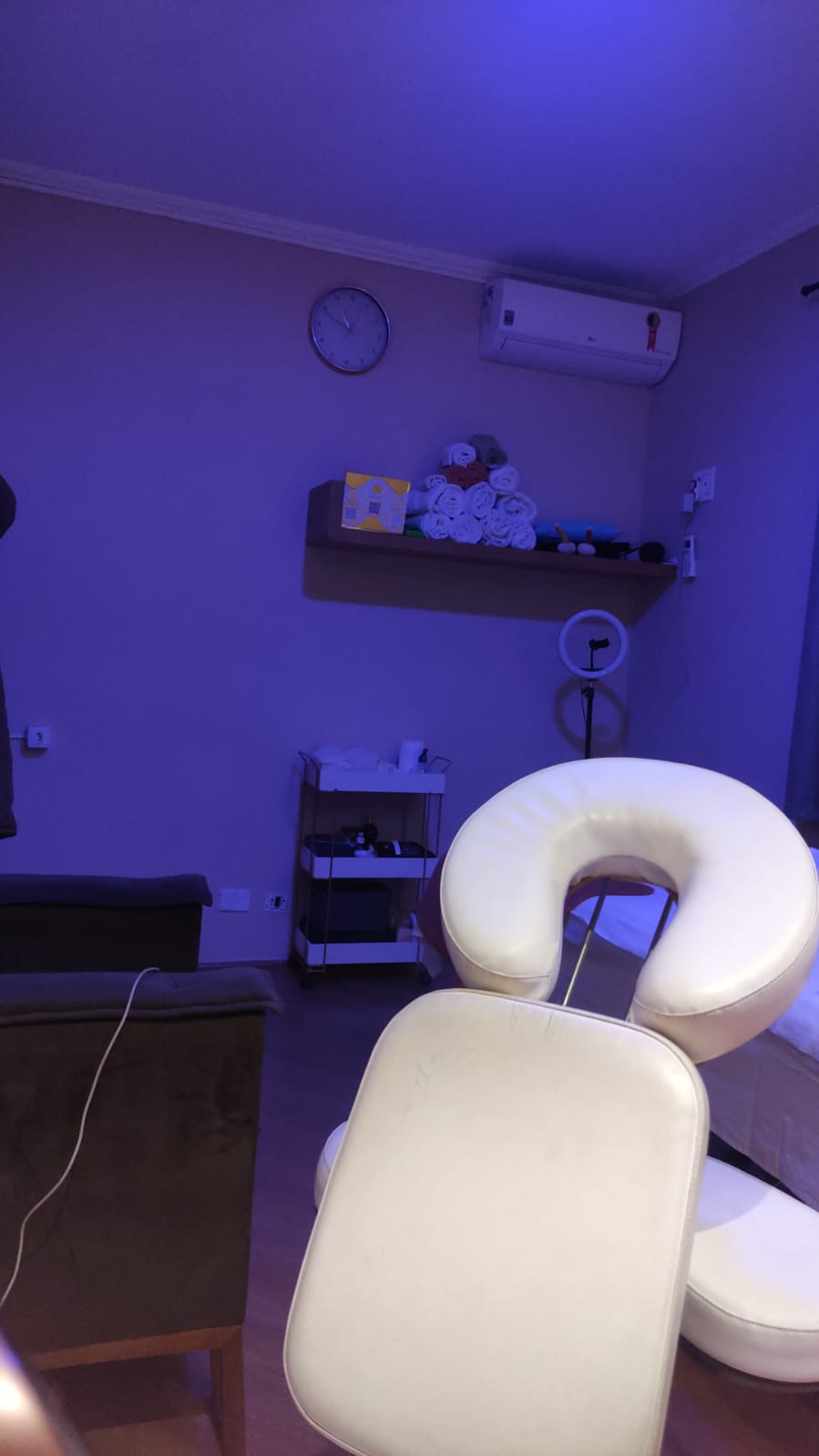 Sala Florescer — detalhes e cadeira de massagem